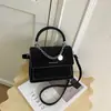 Bolsa de ombro texturizada estilo coreano para mulheres, nova moda de outono de 2026, bolsa de mão simples, bolsa transversal quadrada pequena
