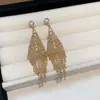 Modernos y Minimalistas Brazaletes para Oreja Retorcidos de Piedra Ojo de Tigre para Mujer, Pendientes Versátiles Vintage, Accesorios para Orejas de Otoño e Invierno con un Toque de Lujo Ligero y de Alta Gama