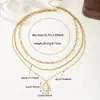 Bestseller transfronterizo: Collar apilado de tres capas con colgante irregular de nácar blanco, cadena chapada en oro, estilo ins, versátil y elegante