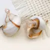 Colgantes de acrílico beige con forma de concha y caracola, ideales para manualidades. Accesorios para pulseras y collares.