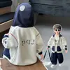 Chaqueta de etiquetas retro para primavera y otoño 2026 nueva moda genial estilo callejero cárdigan top para niños y bebés