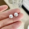 Aretes de Perlas Rosadas Tipo Bollo al Vapor con Cuentas Planas, Aguja de Plata, Joyería para Orejas de Lujo Accesible de Gama Alta, Nuevos Aretes Elegantes de Nicho 2025
