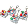 Navidad 9 Teclas Alivio del Estrés Botón Luminoso Juguete para Aliviar el Estrés Keycap Llavero Teclado DIY Juguete para Aliviar el Estrés Colgante