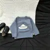 Roupas infantis coreanas: nova coleção primavera e outono apresentando um suéter de tricô macio com gola redonda e bordado de veleiro, adequado para meninos e meninas