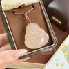 Suministro en Vivo de Estatuas de Buda de Jade Hetian Natural de Colores, Esculturas de Doble Cara de Buda Maitreya Masculino y Femenino, Colgantes de Jade Afgano Rosa Loto