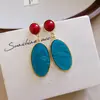 Aretes ovalados de resina con pasador de plata vintage, lujosos y de alta gama, con un diseño único y moderno, y un estilo exagerado