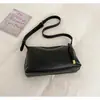 Bolsa de Ombro Transversal Estilo Coreano Cor Sólida PU Simples Versátil Bolsa Transversal Design de Nicho para o Dia a Dia Casual Bolsa Texturizada para Mulheres