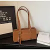 Bolsa Vintage de Nicho Melard para Mulheres Outono e Inverno 2025 Nova Versátil de Alta Qualidade para Ombro e Mão Bolsa Saco