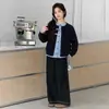 Conjunto de dos piezas de suéter de punto para niñas, nuevo estilo otoño 2026, pantalones de pierna ancha adelgazantes, conjunto de cárdigan de dos piezas simuladas para niños mayores