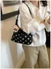 Bolso de lunares de nicho para mujer, gran capacidad, nuevo bolso de hombro cruzado retro de otoño 2026, bolso tote para la ciudad Melard