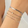 Conjunto de cuatro piezas de pulsera en capas con incrustaciones de diamantes de lujo, superventas en Amazon, acero inoxidable chapado en oro, joyería simple y versátil para mujer