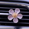 Flores de cinco pétalos con diamantes y pedrería lindas decoraciones creativas para el interior del coche clip de aromaterapia perfumada para salida de aire de coche de mujer