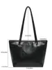 Nuevo bolso tote de alta gama para principios de otoño de 2026, gran capacidad, versátil para ir al trabajo, elegante bolso de mano para mujer al por mayor