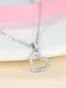 Collar cruzado clásico con corazón de circón, colgante de corazón hueco de lujo ligero para uso diario con incrustación de circón