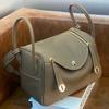 Bolso de Mujer de Cuero Genuino Bolso Lindi 2025 Nuevo Patrón Lichi Caja de Medicina Bolso de Doctor Piel de Vaca de Capa Superior Bolso Cruzado Portátil de Hombro Único