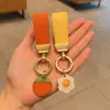 Chaveiro de Couro Minimalista para Carro Estilo Francês, Pingente de Chave Simples e Fofo, Mesmo Estilo do Xiaohongshu, Pingente de Girassol