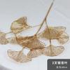 Material de flores doradas Hoja de ginkgo Eucalipto Fruto de acebo rojo Simulación Ramo de flores Cubo de Año Nuevo Adornos de decoración de flores de Año Nuevo