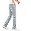Jeans de hombre de alta gama de lujo ligero, corte recto, ajuste holgado, pantalones de marca de moda para hombre, estilo casual de verano fino gris claro, pantalones de hombre gris-blanco