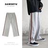 Pantalones de chándal de otoño para hombre, holgados, rectos, de marca moderna, a rayas, deportivos, estilo High Street, ins, estilo coreano, chico moderno, casual, pantalones largos