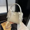 Cross2026 Otoño Invierno Nuevo Bolso de Mano Retro Bolso de Hombro Único para Mujer Bolso Cruzado Tipo Cubo Versátil para Salidas de Moda