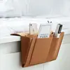 Bolsa de armazenamento suspensa para cabeceira em tecido não tecido simples, bolsa de armazenamento portátil para dormitórios, um item prático para sofás e cabeceiras