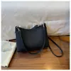 Comercio Electrónico Transfronterizo Más Vendido Nicho Retro Bolso de Axila Nuevo para Mujer Gran Capacidad Versátil para el Trabajo Bolso de Hombro Cruzado