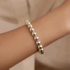 Nueva moda pulsera de perlas europea y americana perla de imitación para damas pulsera hueca de amor joyería joyería simple al por mayor