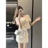 Conjunto de Dos Piezas de Encaje de Lujo Ligero de Moda Inspirado en Chanel para Mujer, Estilo Nuevo Verano 2026, Top y Falda Corta Ajustada a la Cadera, Elegante de Alta Gama