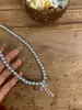 Nuevo Estilo Collar de Perlas para Mujer, Diseño de Nicho Versátil, Cadena Ligera de Lujo para Clavícula, Joyería con Colgante de Lazo al por Mayor