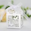 Caja de dulces de boda de Amazon transfronteriza, cartón para dulces con lazo de mariposa hueco láser, caja de regalo de boda de fábrica en stock