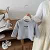 Abrigo para Niños Estilo Otoño Invierno 2026 Nuevo Bebé Dibujos Animados con Capucha Ropa de Algodón Top Conjunto de Tres Piezas Ropa Cálida con Felpa