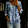 Nueva blusa de mujer de manga larga con botones y cuello en V estampada transfronteriza, elegante y estilosa para ir al trabajo, blusa casual única y a la moda