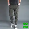 Design de múltiplos bolsos, novos calças de harém finas de verão para homens, da moda, tendência, corte slim, calças casuais largas com punhos nas barras para homens
