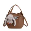 Versión Coreana Bolso Cubo Retro de Mano de Nicho para Mujer 2025 Invierno Nuevo Elegante Casual Versátil Bolso de Hombro Cruzado