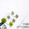 Venta al por mayor del fabricante 15*12 mm Forma de Corazón Accesorios para Joyería DIY con la Palabra "Love Handmade" Impresa en Ellos, Colgante de Collar de Corazón con Letra