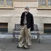 Chaqueta de trabajo de mezclilla cruda con diseño de hebilla de avión clásica americana, estilo corto versátil unisex con diseño plisado abrigo de mezclilla