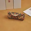 Estuche de regalo portátil estilo chino para lápiz labial, sencillo y elegante, con espejo, plegable y a prueba de polvo.