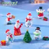 Nuevo producto transfronterizo: Paisaje en miniatura con un muñeco de nieve y Santa Claus sosteniendo un letrero, decoraciones DIY de escena de nieve, adornos de escritorio