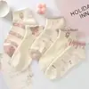 Calcetines de dibujos animados para mujer al por mayor, primavera y verano, transpirables, finos, lindos, versión coreana, versátiles, calcetines deportivos tipo barco, de boca baja y poco profunda
