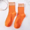 Venta Directa de Fábrica calcetines de algodón de media pantorrilla nuevos para primavera y verano, a rayas de tres líneas, estilo casual universitario, calcetines de moda de media pantorrilla