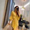 Nova Coleção Primavera 2025 Europeia e Americana Transfronteiriça Feminina Estilo Preguiçoso Cor Sólida Moda Decote V Simples Irregular Vestido Feminino