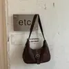 Bolso retro de axila estilo coreano, modelo nuevo 2026, bolso de hombro con sensación relajada, bolso cruzado simple casual de nicho para el día a día