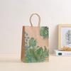 Festival de siembra de árboles de hoja de tortuga selvática transfronterizo Bolso de mano con logotipo impreso Bolsa de regalo Bolsa de compras al por mayor Papel Kraft