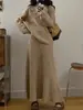 Suéter Pulôver Gola V com Flores Estéreo Francês 2025 Novo Estilo Outono e Inverno com Saia Tricô Conjunto de Duas Peças para Mulheres