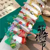 2026 Novo Estilo Pulseira com Pingente Produto Acabado Saquinho Infantil Festival do Barco-Dragão Fio de Cinco Cores de Alto Valor Pulseira Pequena de Zongzi para Bebê
