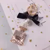 Llavero creativo de estilo coreano con incrustaciones de diamantes, colgante para bolso, accesorio, llavero de metal para coche, baratijas para dama