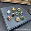 Anillo Nuevo Estilo con Incrustaciones Completas de Diamante de Cristal, Estilo Retro Personalizado, Joyería Transfronteriza Europea y Americana, Anillo Ojo de Gato, Color Ecológico, Fuente de Suministro