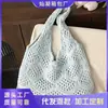 Bolsa de tricô casual vazada estilo coreano para mulheres, nova bolsa tote de palha grande capacidade para o verão de 2026, bolsa de praia