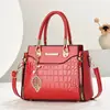 Bolso de mano de alta gama transfronterizo, bolso tote pequeño, bolso cruzado, bolso de hombro, nuevo bolso de moda con patrón de cocodrilo de gran capacidad para mujer