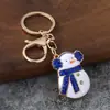 Llavero de Navidad con purpurina de goteo de aceite, colgantes de Papá Noel, muñeco de nieve, árbol de Navidad, adornos metálicos para bolso para Navidad